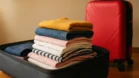 Sonhar com mala cheia de roupas: mudanças e escolhas
